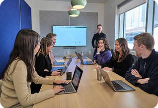 Neuron UX Team at a Conference Table